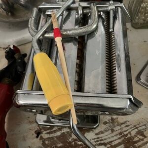 Stainless Steel Pasta Maker with Yellow Handle